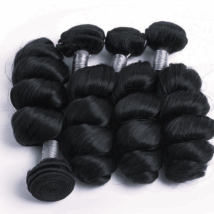 Natural Black Loose Wave Human Hair bundles with soft, bouncy curls. 100% human hair extensions for a voluminous, natural look.
